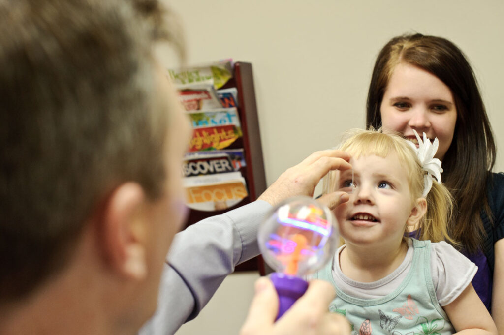 Little girl getting her eyes checked