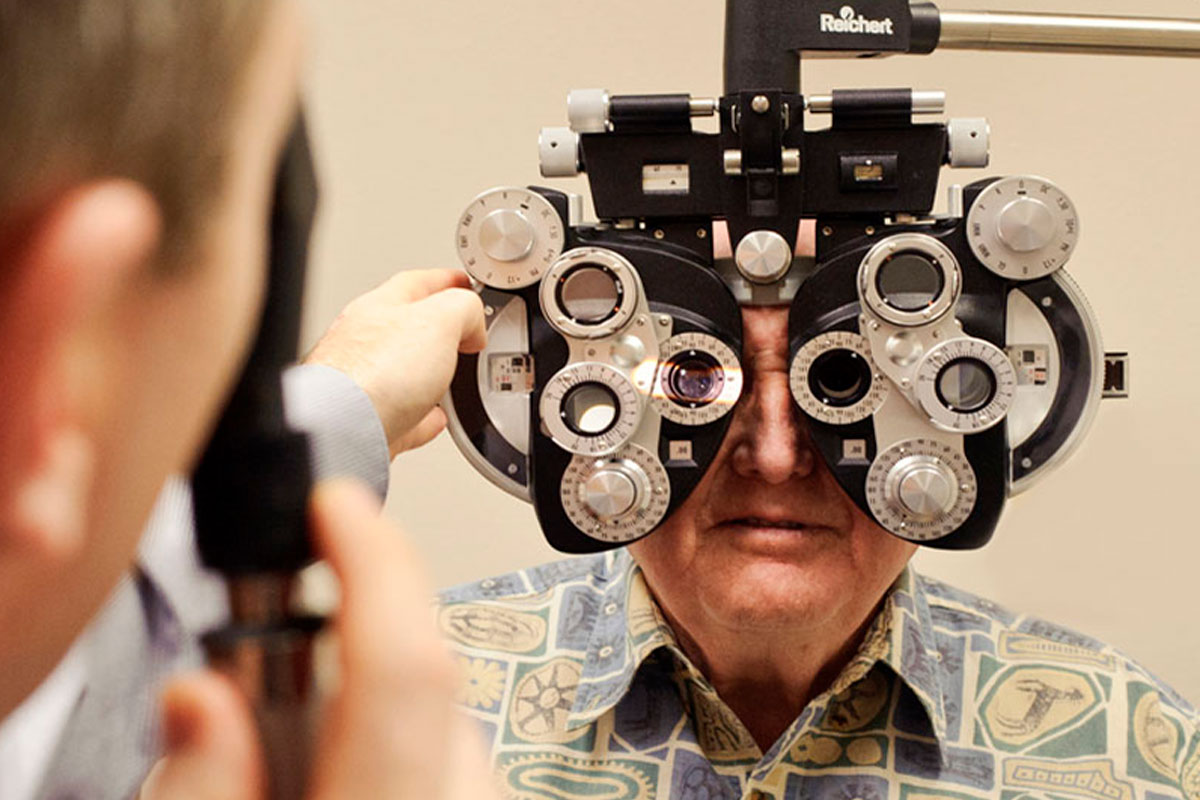 Aaron J. Affleck performing and eye exam