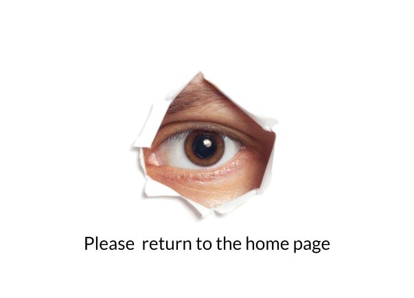 Single brown eye peeking through torn paper